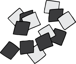 A pile of square cards with black on one side and white on the other side.